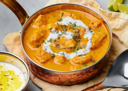 Murgh,Makhani,Or,Butter,Chicken,In,Copper,Bowl,On,Gray